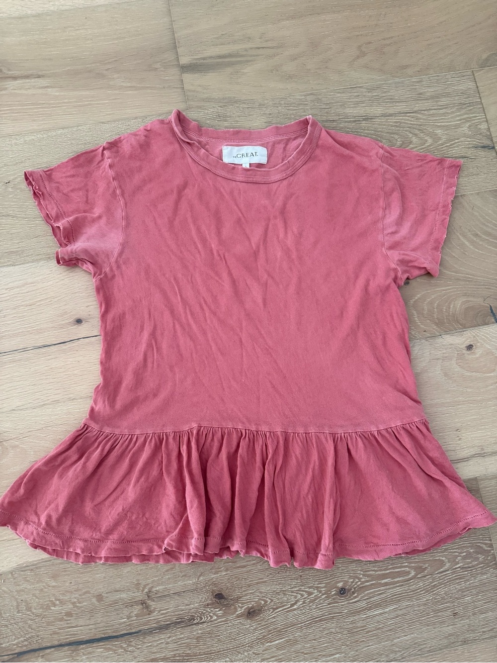 The Great Peplum Distressed Top